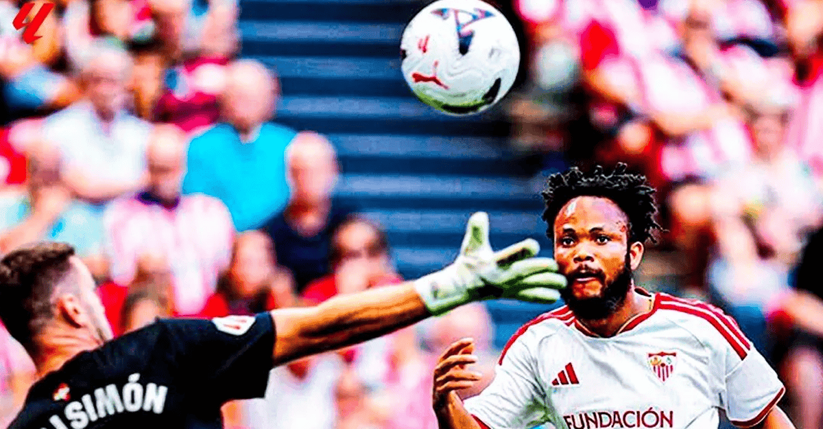 Chidera Ejuke in Sevilla jersey during a match, with coach Luis Garcia Plaza on the sideline.